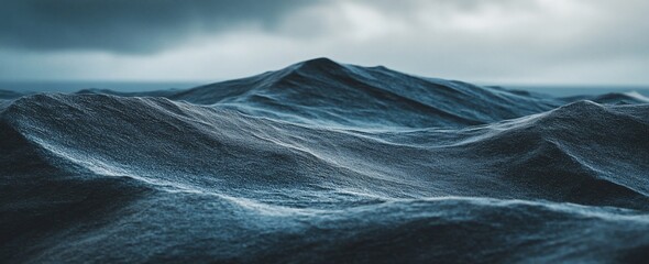 Wall Mural - dark, moody landscape of rolling hills under a cloudy sky.