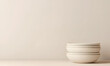 © ชัยธวัช ผาผง - Stacked white bowls minimalist kitchen food photography neutral background close-up view culinary aesthetics
