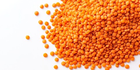 Aufkleber - Red lentils displayed beautifully against a white background, framing the vibrant color and texture of red lentils, perfect for showcasing their nutritional appeal and culinary uses.