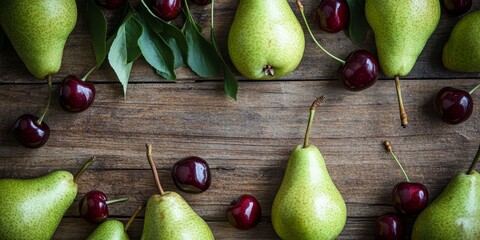 Poster - Green pears and cherries create a beautiful flat lay on a wooden background, showcasing the vibrant colors of green pears and cherries with ample copy space for design purposes.