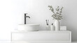 © Prasanth - White vanity with ceramic sink and faucet in modern style white bathroom interior detail concept