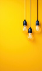 Wall Mural - Bright and Cheerful Light Bulbs Hanging Against a Vibrant Yellow Background for Home Decor Inspiration