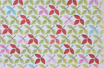 Wall Mural - decorative scrapbooking paper with leaves in green pink green on red