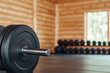 © Agata25 - Weightlifting equipment in wooden gym with dumbbells and barbell