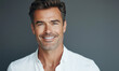 © MariAnnaCreative - Portrait of a confident man in a white shirt, smiling