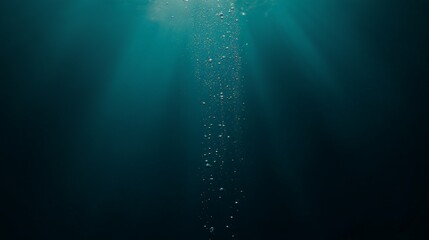 Poster - Sunbeams filtering through the ocean's surface illuminate rising air bubbles, creating a captivating underwater scene filled with tranquility and an air of mystery in the deep blue sea