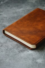 Canvas Print - Brown leather journal on table