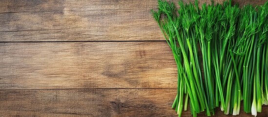 Aufkleber - Fresh green onions on a rustic wooden background with ample copy space for text or design elements.
