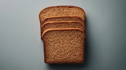 Poster - Sliced brown bread loaf on a flat surface with copy space for text placement