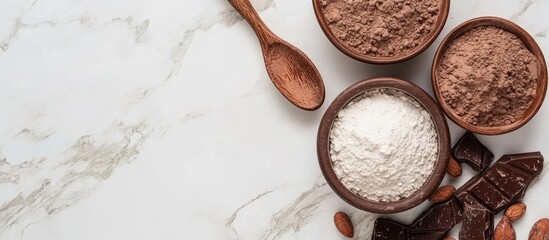 Aufkleber - Assorted bowls of flour and cocoa powder on marble countertop with chocolate pieces and wooden spoon Copy Space