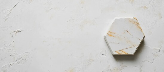 Aufkleber - Hexagonal marble tile on a textured white background with copy space for design purposes
