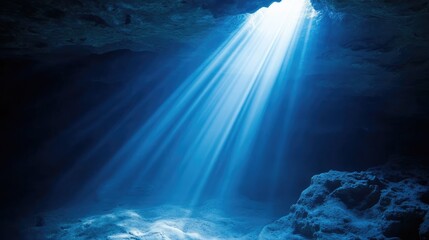 Poster - Underwater cave with light rays filtering through the water surface creating a tranquil blue ambiance Copy Space