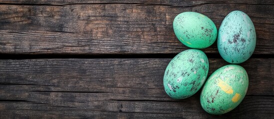 Aufkleber - Colorful decorative eggs on rustic wooden background with copy space for text.