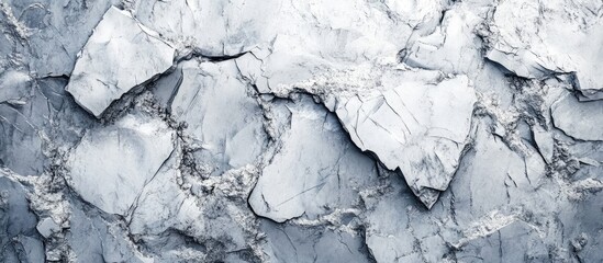 Poster - Textured gray rock surface with cracked and fragmented layers suitable for background use Copy Space