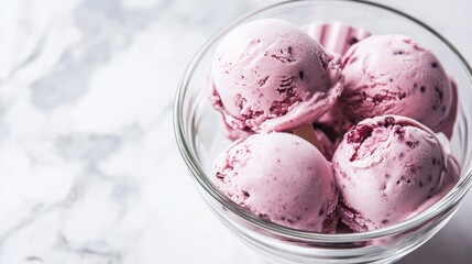 Poster - Bowl of raspberry ice cream scoops on marble countertop with copy space