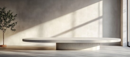 Poster - Modern minimalist round table in contemporary interior setting with sunlight casting shadows on textured wall and floor Copy Space