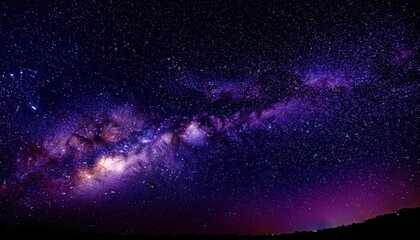 Wall Mural - breathtaking view of the milky way galaxy with vibrant purple hues and star clusters, perfect for celestial or cosmic themed projects