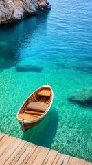 Aufkleber - Wooden boat gently floating, moored to a wooden dock in tranquil, crystal clear turquoise water, offering a serene escape and inviting exploration of the breathtaking coastal scenery