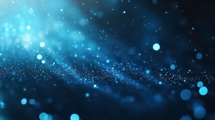 Wall Mural - bright blue light burst with soft lens flare effects on dark background