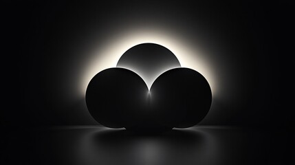 Aufkleber - Three dark spheres illuminated by a bright halo.