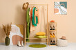 © Pixel-Shot - Interior of modern dressing room with rack, pampas grass and shelving unit