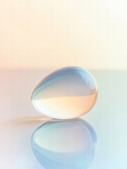 Poster - Unique glass like droplet rests on a reflective surface showcasing soft pastel colors and ambient lighting. Generative AI