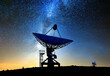 © venars.original - satellite dish against a night sky with milkyway