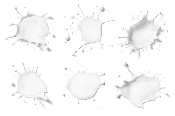 Wall Mural - Set of milk splashes isolated on a white background