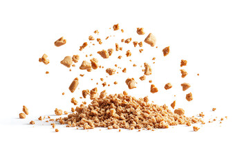 Poster - Pile cake crumbs, cookie pieces flying isolated on a white background