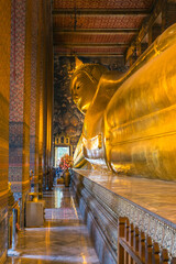 golden buddha statue at temple Wat Pho