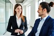 © SimpleDesignStudio - Professional Business Meeting: Smiling Colleagues Engaging in Positive Communication in Modern Office Setting