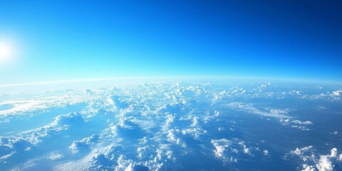 Poster - Clear blue sky view showcasing the beauty of a clear blue sky as seen from the earth, highlighting the tranquility and charm of a serene clear blue sky landscape.