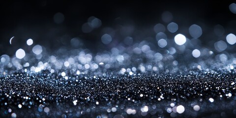 Fototapete - An abstract background in shades of black, white, and blue showcases crushed glitter, creating a striking visual effect with the glitter enhancing the overall aesthetic.