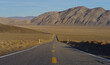 © angeldibilio - Narrow highway through the desert. Highway 168, looking east, Inyo County, California. Date, January 5, 2025.