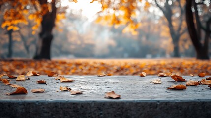 Poster - Concrete tabletop set against a vibrant autumn park backdrop with fallen leaves creating a warm atmosphere for outdoor product presentation ideal for showcasing beauty and food items