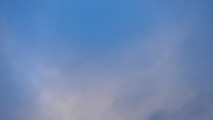 Aufkleber - Observe dynamic flow of clouds against a vibrant blue sky, real time capture. Experience gradual shifts in skyscape during different moments in the day. Weather forecast. Climate change. Slow motion.
