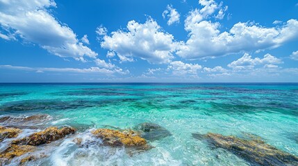 Aufkleber - Along the coastline, unique springs emerge from a vibrant sea, creating an enchanting display of colors. Sunlight dances on the water, reflecting the beauty of nature at midday
