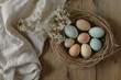 © Ackbara Studio - A cozy rustic Easter setting featuring pastel eggs in a woven nest, surrounded by soft linen and delicate wildflowers. A perfect composition celebrating spring’s natural beauty and warmth