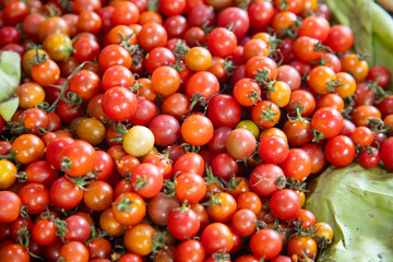 Mexican tomatillos. Small fresh green tomatoes at the Abastos market in Oaxaca, Mexico.