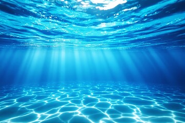 Aufkleber - Tranquil underwater scene with sunlight beams shining through clear blue water.