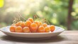 © Fenny - Golden cherries plate, garden background, sunlit, healthy food