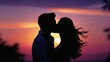 © Robbie Smith 1  - Silhouette of a couple sharing a kiss against a colourful sunset