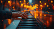 © gabriele - A close-up shot of hands playing the piano, with a blurred background showing an urban street scene at night.