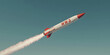 © A2Z AI  - Missile launch against a clear blue sky. A powerful rocket ascends, leaving a trail of smoke.