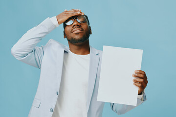 Confused businessman holding blank paper, stressed expression, casual business attire, light blue background, modern and minimalist concept, conveying frustration and contemplation