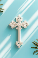 Canvas Print - Ornate white cross on a light blue wall, bathed in sunlight. Peaceful and serene.