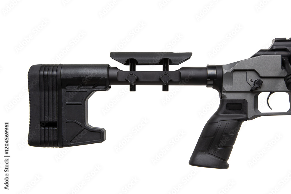 A modern, gray precision rifle with a long barrel, adjustable stock ...