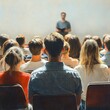 © Anzhela - Audience at Business and Entrepreneurship Symposium Conference Presentation with Speaker in Auditorium