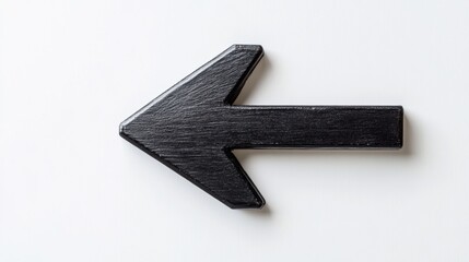 Leinwandbilder - Black wooden arrow pointing left on a white background emphasizing direction and guidance in design aesthetics. Generative AI