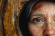 © Balaraw - Close-up of a woman's eye with scratches on her forehead